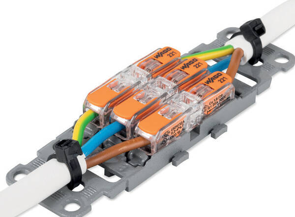WAGO 221-2411 inline splicing connector with orange lever and transparent housing for joining two wires – image 4