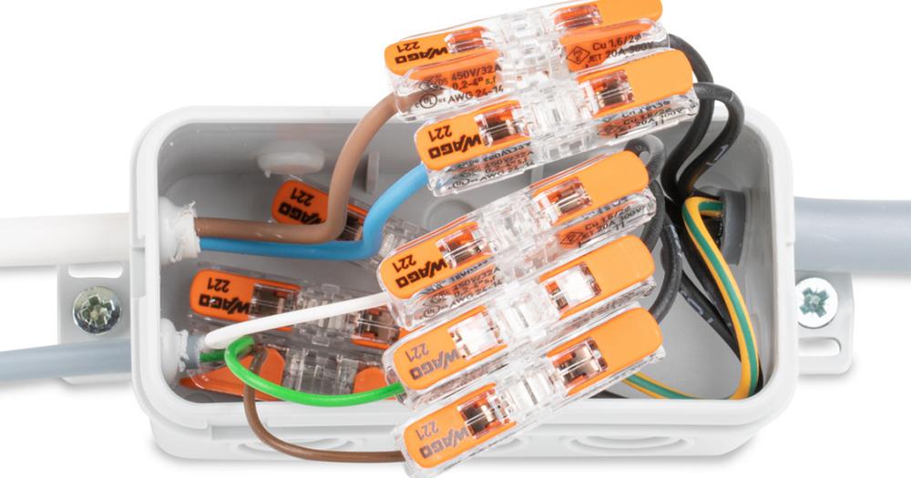 WAGO 221-2411 inline splicing connector with orange lever and transparent housing for joining two wires – image 6