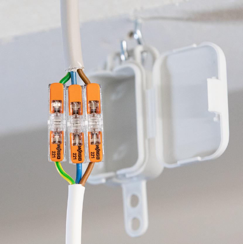 WAGO 221-2411 inline splicing connector with orange lever and transparent housing for joining two wires – image 7